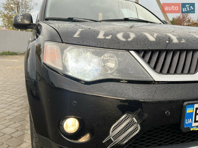 Мицубиси Аутлендер 2008 в Кременчуге на Automoto.ua Черный Мицубиси Аутлендер, объемом двигателя 2.4 л и пробегом 230 тыс. км за 6850 $, фото 69 на Automoto.ua