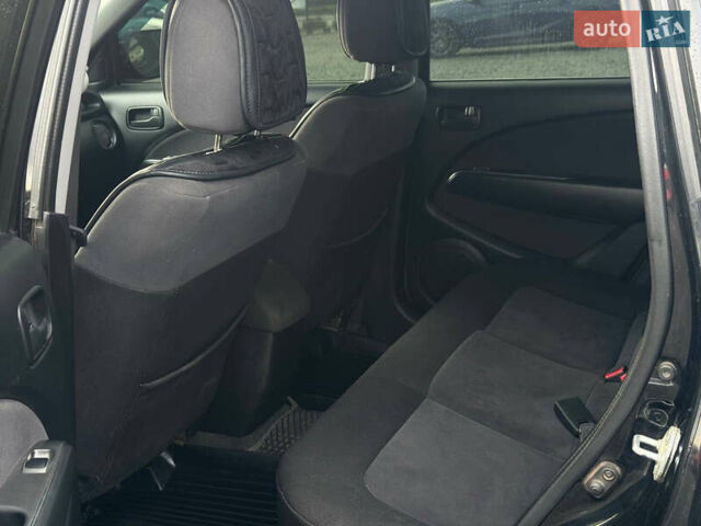 Черный Мицубиси Аутлендер, объемом двигателя 2 л и пробегом 240 тыс. км за 5500 $, фото 9 на Automoto.ua