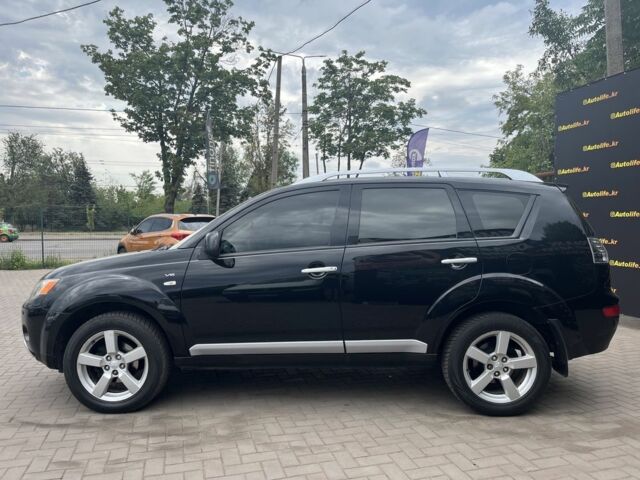 Черный Мицубиси Аутлендер, объемом двигателя 3 л и пробегом 235 тыс. км за 9800 $, фото 6 на Automoto.ua