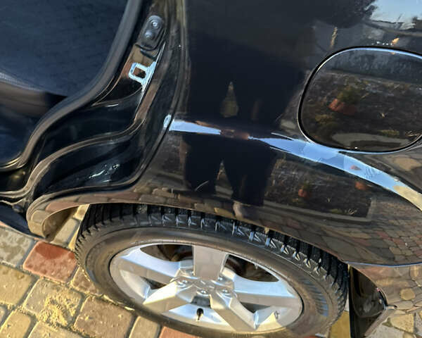 Черный Мицубиси Аутлендер, объемом двигателя 2.36 л и пробегом 253 тыс. км за 9600 $, фото 9 на Automoto.ua