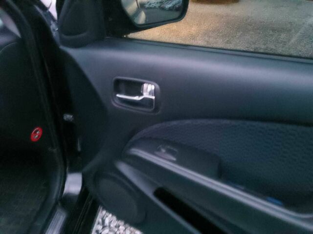 Черный Мицубиси Аутлендер, объемом двигателя 2 л и пробегом 271 тыс. км за 6940 $, фото 21 на Automoto.ua