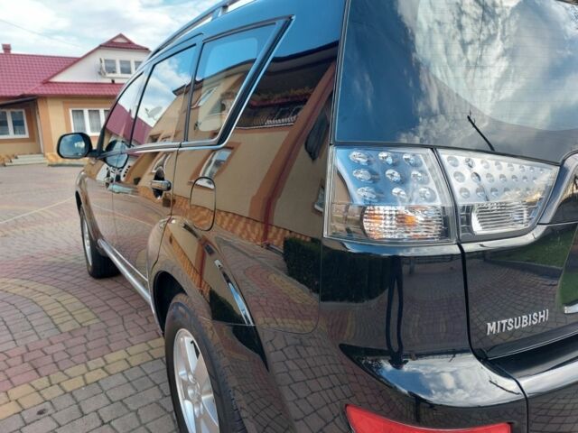 Черный Мицубиси Аутлендер, объемом двигателя 2 л и пробегом 249 тыс. км за 8750 $, фото 16 на Automoto.ua