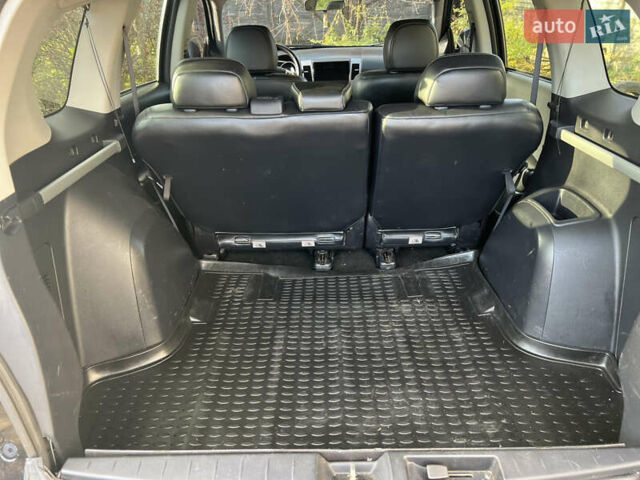 Чорний Міцубісі Аутлендер, об'ємом двигуна 2.4 л та пробігом 221 тис. км за 8700 $, фото 28 на Automoto.ua