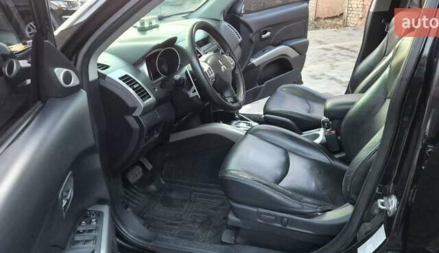Чорний Міцубісі Аутлендер, об'ємом двигуна 2.4 л та пробігом 230 тис. км за 9700 $, фото 12 на Automoto.ua