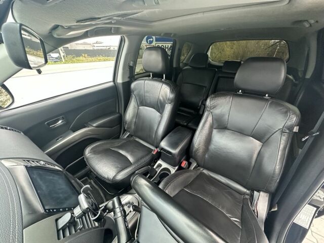 Чорний Міцубісі Аутлендер, об'ємом двигуна 2.4 л та пробігом 218 тис. км за 10000 $, фото 2 на Automoto.ua