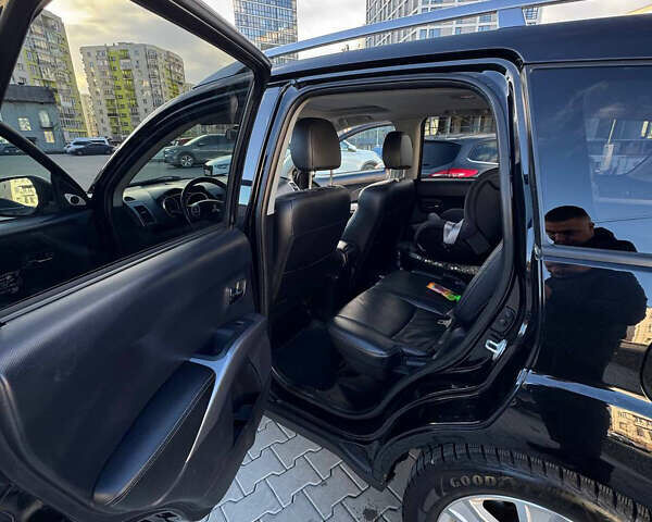 Черный Мицубиси Аутлендер, объемом двигателя 1.97 л и пробегом 202 тыс. км за 9700 $, фото 7 на Automoto.ua