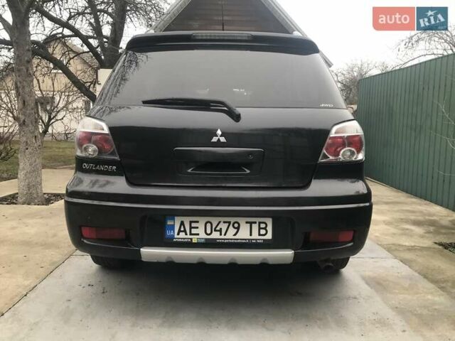 Чорний Міцубісі Аутлендер, об'ємом двигуна 2.38 л та пробігом 207 тис. км за 7000 $, фото 30 на Automoto.ua