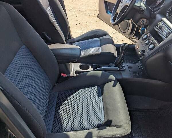 Черный Мицубиси Аутлендер, объемом двигателя 2 л и пробегом 189 тыс. км за 7100 $, фото 4 на Automoto.ua