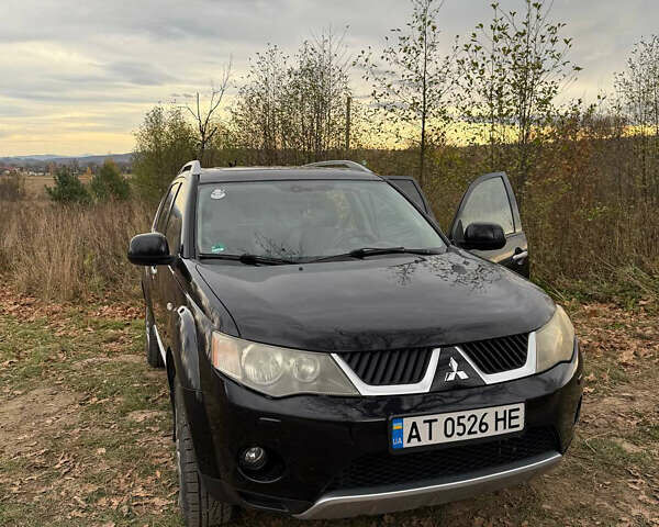 Черный Мицубиси Аутлендер, объемом двигателя 2.18 л и пробегом 233 тыс. км за 9600 $, фото 4 на Automoto.ua