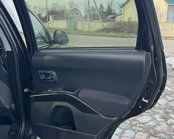 Чорний Міцубісі Аутлендер, об'ємом двигуна 2.36 л та пробігом 293 тис. км за 7900 $, фото 17 на Automoto.ua