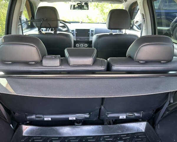 Черный Мицубиси Аутлендер, объемом двигателя 2.36 л и пробегом 240 тыс. км за 9599 $, фото 16 на Automoto.ua