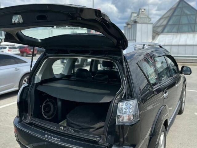 Чорний Міцубісі Аутлендер, об'ємом двигуна 2.4 л та пробігом 137 тис. км за 8999 $, фото 4 на Automoto.ua