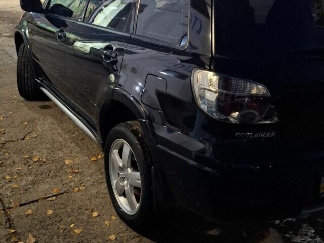 Чорний Міцубісі Аутлендер, об'ємом двигуна 2 л та пробігом 117 тис. км за 7900 $, фото 4 на Automoto.ua