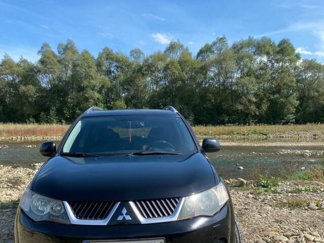 Черный Мицубиси Аутлендер, объемом двигателя 3 л и пробегом 150 тыс. км за 400 $, фото 1 на Automoto.ua