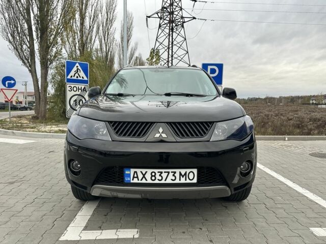 Чорний Міцубісі Аутлендер, об'ємом двигуна 2.4 л та пробігом 218 тис. км за 10000 $, фото 7 на Automoto.ua
