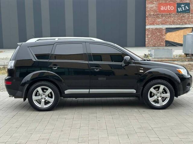Черный Мицубиси Аутлендер, объемом двигателя 3 л и пробегом 248 тыс. км за 9800 $, фото 22 на Automoto.ua