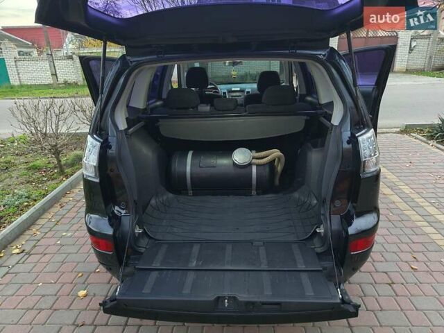 Черный Мицубиси Аутлендер, объемом двигателя 2.36 л и пробегом 192 тыс. км за 8800 $, фото 19 на Automoto.ua