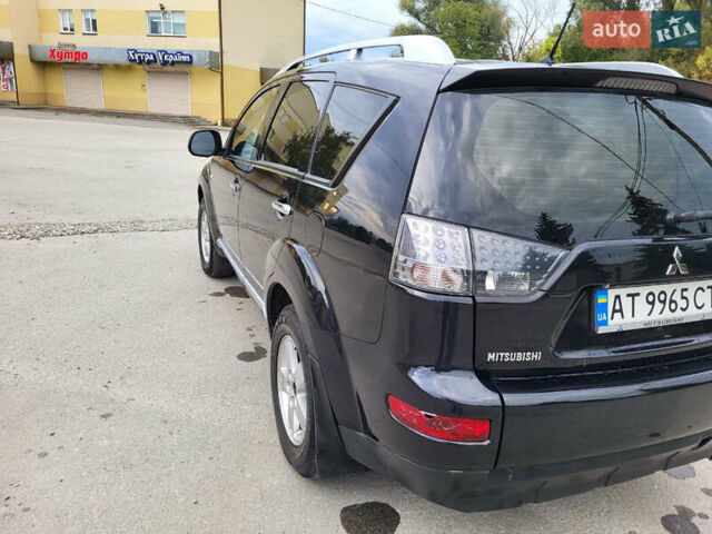 Чорний Міцубісі Аутлендер, об'ємом двигуна 2.4 л та пробігом 205 тис. км за 8400 $, фото 15 на Automoto.ua