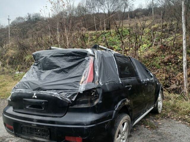 Чорний Міцубісі Аутлендер, об'ємом двигуна 0 л та пробігом 177 тис. км за 1700 $, фото 2 на Automoto.ua