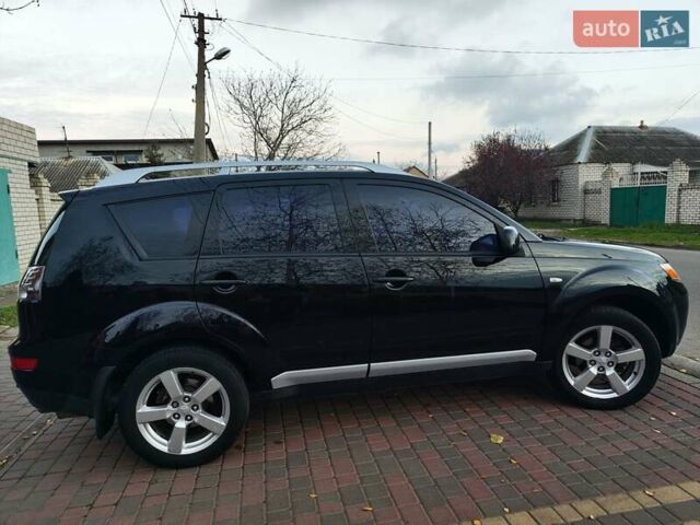 Черный Мицубиси Аутлендер, объемом двигателя 2.36 л и пробегом 192 тыс. км за 8800 $, фото 12 на Automoto.ua