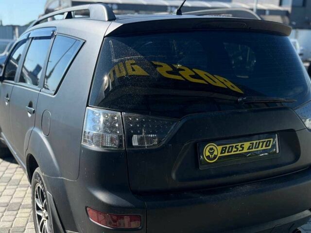 Черный Мицубиси Аутлендер, объемом двигателя 3 л и пробегом 308 тыс. км за 7600 $, фото 4 на Automoto.ua