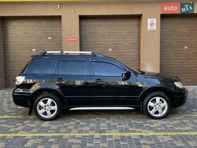 Черный Мицубиси Аутлендер, объемом двигателя 2 л и пробегом 270 тыс. км за 7199 $, фото 10 на Automoto.ua