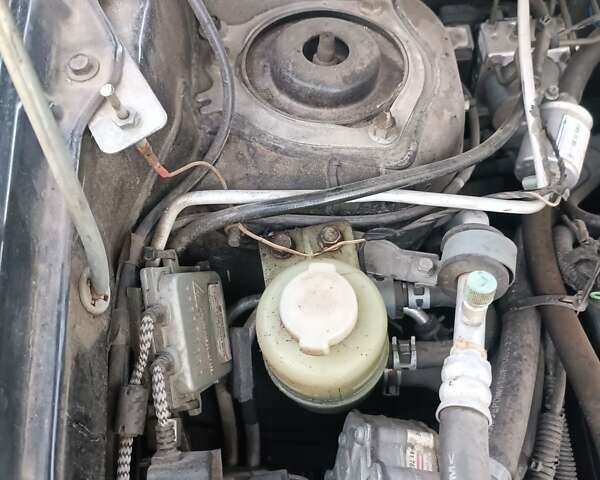 Черный Мицубиси Аутлендер, объемом двигателя 2 л и пробегом 190 тыс. км за 6900 $, фото 47 на Automoto.ua