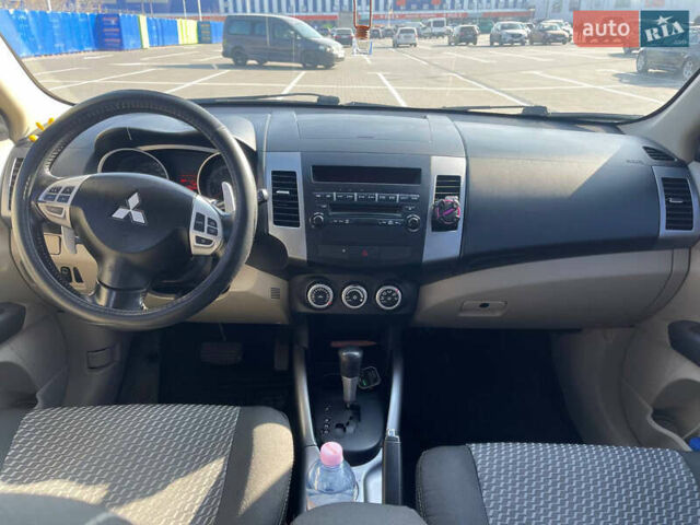 Чорний Міцубісі Аутлендер, об'ємом двигуна 2.4 л та пробігом 195 тис. км за 8600 $, фото 16 на Automoto.ua