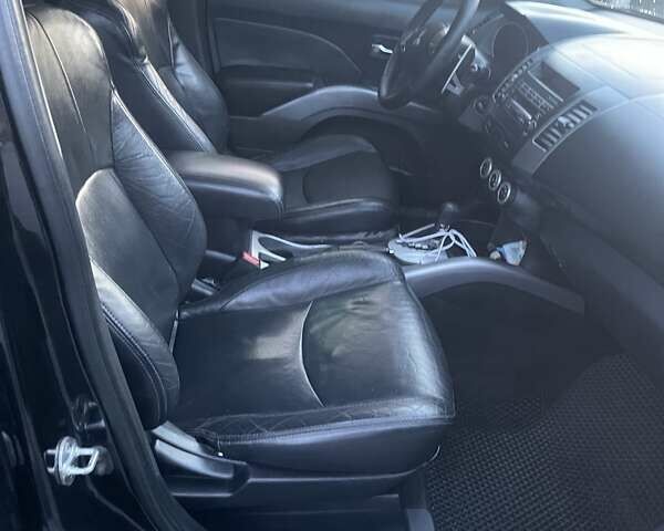 Черный Мицубиси Аутлендер, объемом двигателя 2.4 л и пробегом 290 тыс. км за 9500 $, фото 21 на Automoto.ua