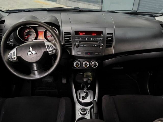 Черный Мицубиси Аутлендер, объемом двигателя 2.4 л и пробегом 199 тыс. км за 6470 $, фото 7 на Automoto.ua