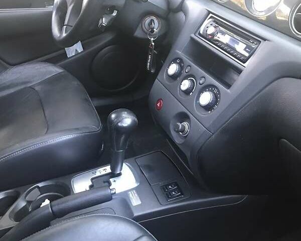 Чорний Міцубісі Аутлендер, об'ємом двигуна 2.38 л та пробігом 207 тис. км за 7000 $, фото 55 на Automoto.ua