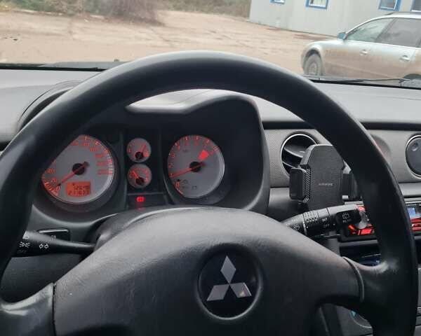 Черный Мицубиси Аутлендер, объемом двигателя 2 л и пробегом 212 тыс. км за 7900 $, фото 8 на Automoto.ua