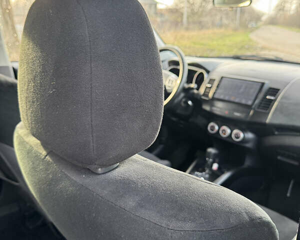 Чорний Міцубісі Аутлендер, об'ємом двигуна 2.36 л та пробігом 293 тис. км за 7900 $, фото 18 на Automoto.ua