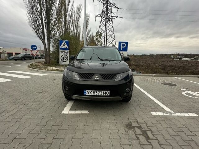 Чорний Міцубісі Аутлендер, об'ємом двигуна 2.4 л та пробігом 218 тис. км за 10000 $, фото 13 на Automoto.ua
