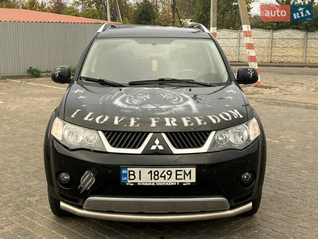 Мицубиси Аутлендер 2008 в Кременчуге на Automoto.ua Черный Мицубиси Аутлендер, объемом двигателя 2.4 л и пробегом 230 тыс. км за 6850 $, фото 21 на Automoto.ua