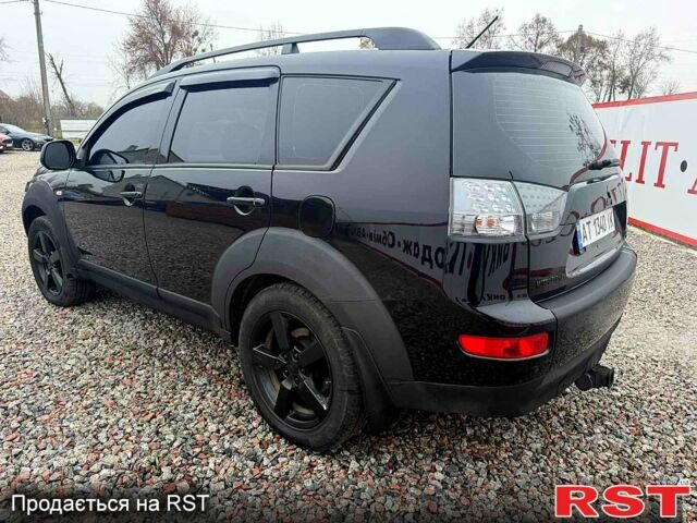 Черный Мицубиси Аутлендер, объемом двигателя 2.4 л и пробегом 200 тыс. км за 9999 $, фото 3 на Automoto.ua