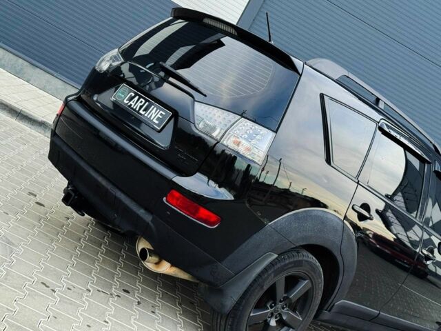 Черный Мицубиси Аутлендер, объемом двигателя 2.4 л и пробегом 199 тыс. км за 6470 $, фото 6 на Automoto.ua