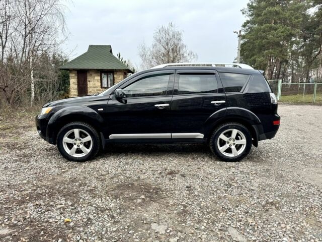 Чорний Міцубісі Аутлендер, об'ємом двигуна 2.4 л та пробігом 229 тис. км за 9790 $, фото 3 на Automoto.ua