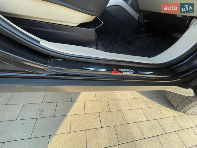 Чорний Міцубісі Аутлендер, об'ємом двигуна 2.4 л та пробігом 195 тис. км за 8600 $, фото 10 на Automoto.ua