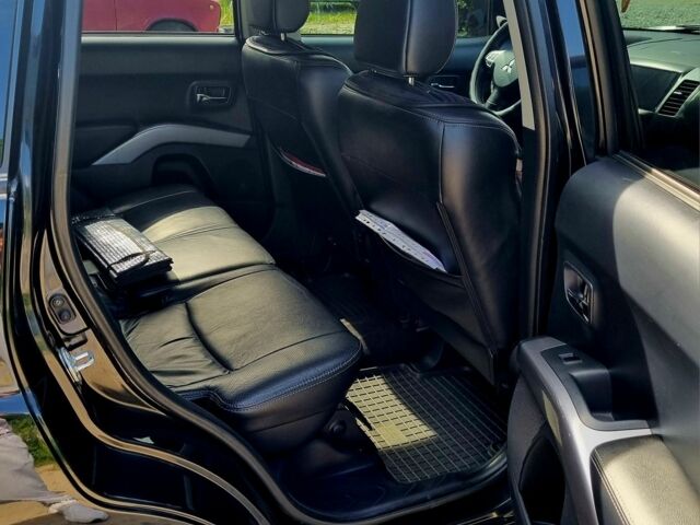 Черный Мицубиси Аутлендер, объемом двигателя 2.4 л и пробегом 234 тыс. км за 9800 $, фото 4 на Automoto.ua