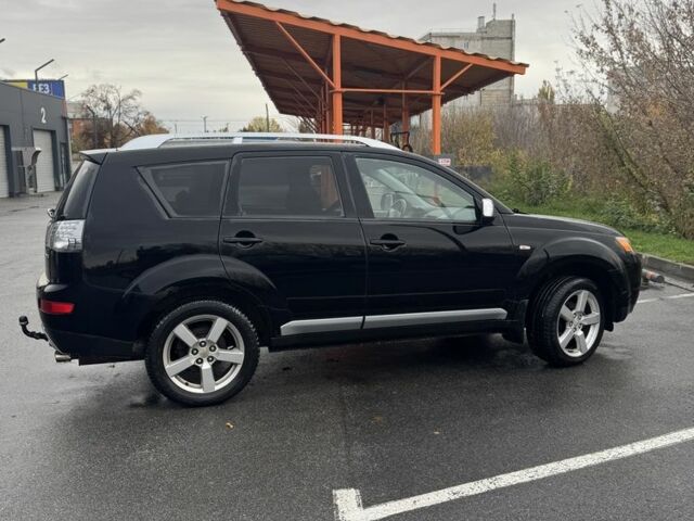 Черный Мицубиси Аутлендер, объемом двигателя 2 л и пробегом 320 тыс. км за 4800 $, фото 6 на Automoto.ua