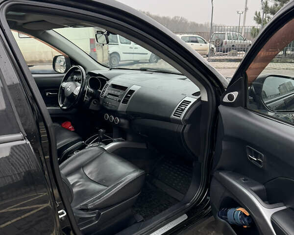 Черный Мицубиси Аутлендер, объемом двигателя 2.36 л и пробегом 120 тыс. км за 10100 $, фото 17 на Automoto.ua