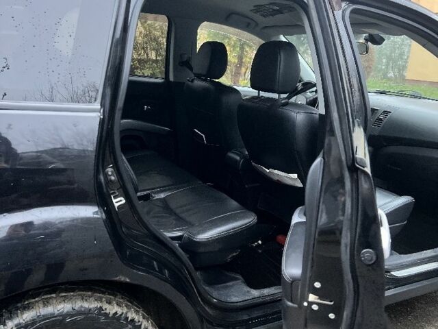 Чорний Міцубісі Аутлендер, об'ємом двигуна 2 л та пробігом 330 тис. км за 4900 $, фото 9 на Automoto.ua