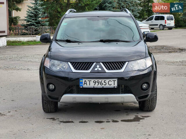 Чорний Міцубісі Аутлендер, об'ємом двигуна 2.4 л та пробігом 205 тис. км за 8400 $, фото 1 на Automoto.ua