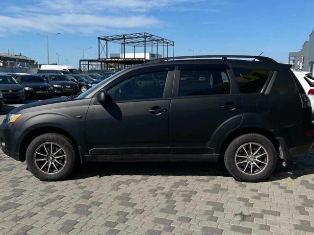 Черный Мицубиси Аутлендер, объемом двигателя 3 л и пробегом 308 тыс. км за 7600 $, фото 3 на Automoto.ua