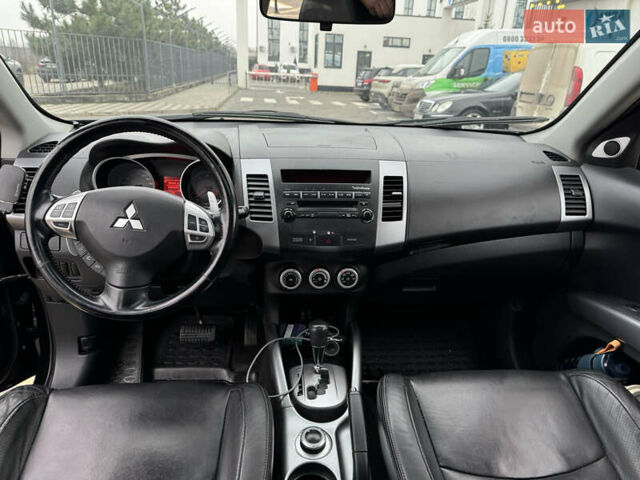 Черный Мицубиси Аутлендер, объемом двигателя 2.36 л и пробегом 120 тыс. км за 10100 $, фото 19 на Automoto.ua
