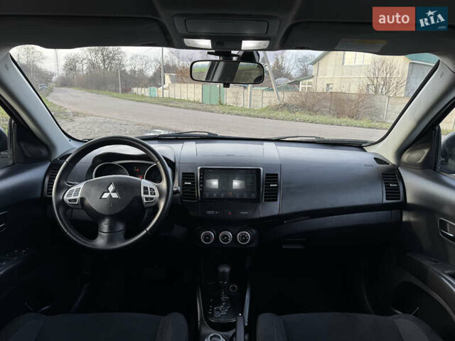 Чорний Міцубісі Аутлендер, об'ємом двигуна 2.36 л та пробігом 293 тис. км за 7900 $, фото 21 на Automoto.ua