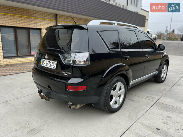 Чорний Міцубісі Аутлендер, об'ємом двигуна 2.4 л та пробігом 221 тис. км за 8700 $, фото 11 на Automoto.ua