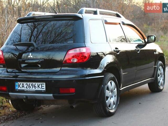 Черный Мицубиси Аутлендер, объемом двигателя 2 л и пробегом 189 тыс. км за 7200 $, фото 19 на Automoto.ua