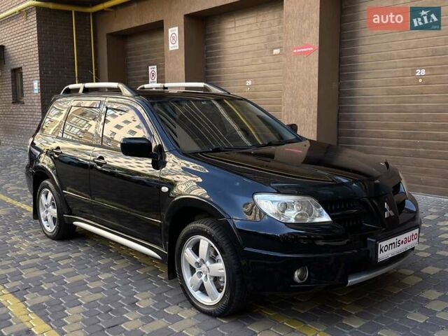 Черный Мицубиси Аутлендер, объемом двигателя 2 л и пробегом 270 тыс. км за 7199 $, фото 12 на Automoto.ua